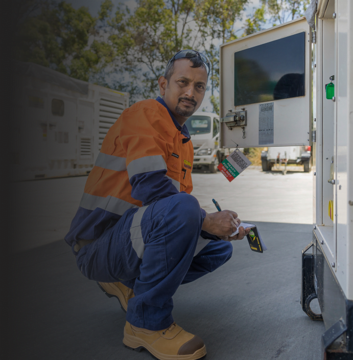 A staff is servicing the generator